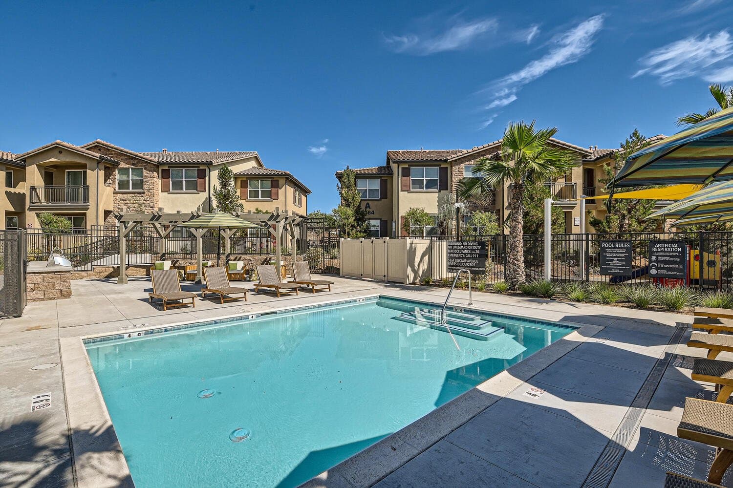 Sparkling resort-style pool at Pinebrook Apartment Homes